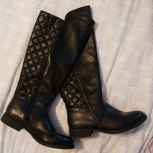Tall black boots